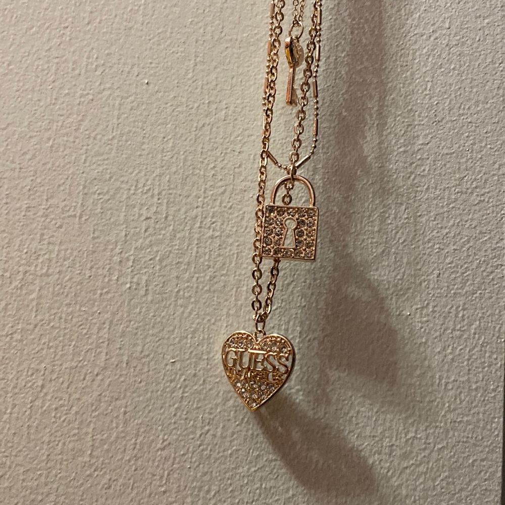 Guess three layer necklace with matching earrings